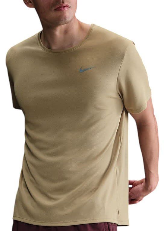 beige nike miler
