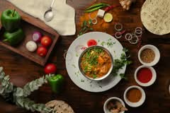 Taj Protein Bowls (66 21st Ave)