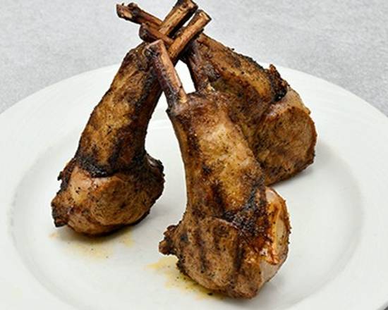 Order Double-Cut Lamb Rib Chops* (3) 6 Ounce Chops food online from The Palm (1750 Tysons Blvd. store, McLean on bringmethat.com