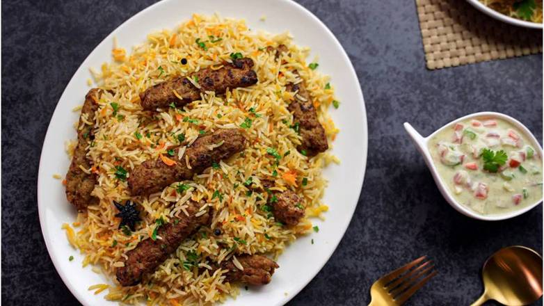 Lamb Seekh Kabob Over Rice