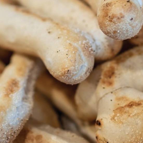 *(12) Hand Rolled Breadsticks & Dip
