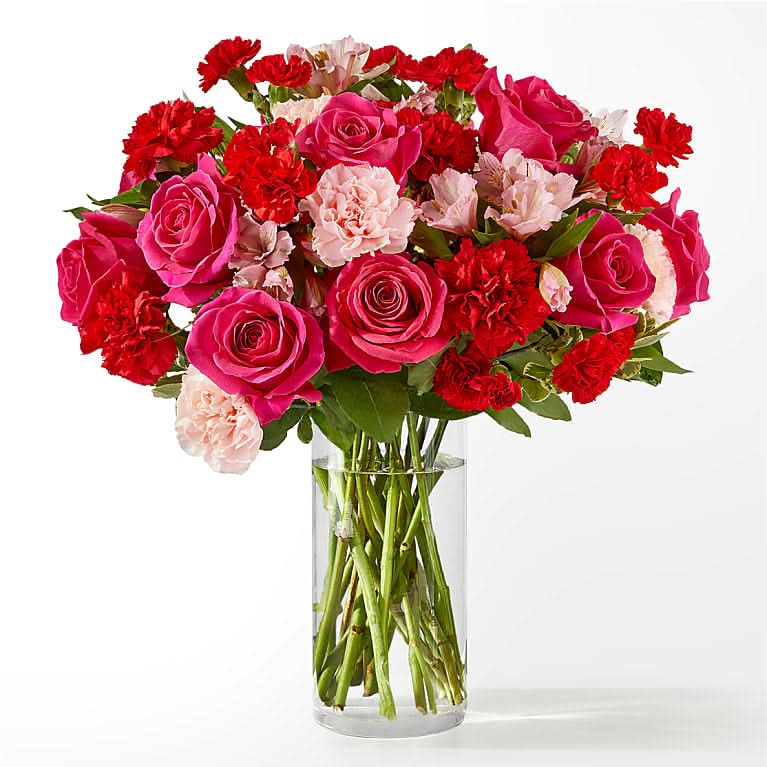 HEARFELT CONDOLENCES ARRANGMENT EXQUISITE