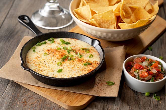 Order Queso & Chips food online from Logan's Roadhouse store, Spring Hill on bringmethat.com