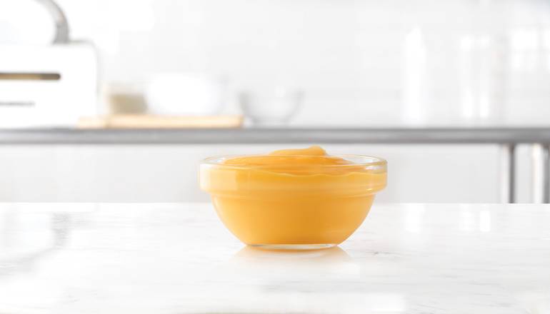 Cup of Cheddar Sauce