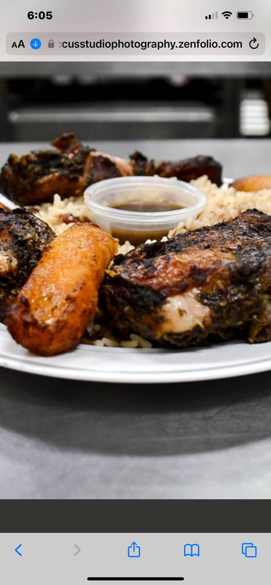 Jerk chicken Served with Jasmine Rice cabbage and plantains