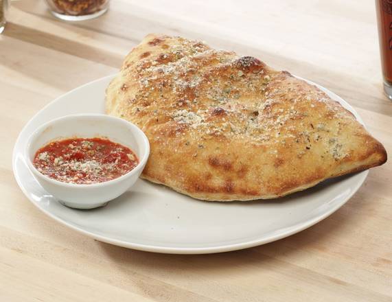 #4 - Calzone with 1 Regular Topping Lunch Special