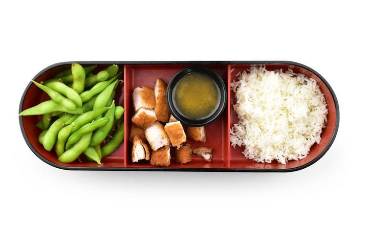Bento box with chicken pieces