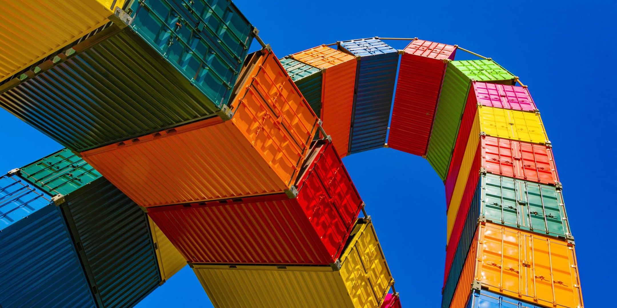 uBuild: Fast and Safe Building of Thousands of Container Images
