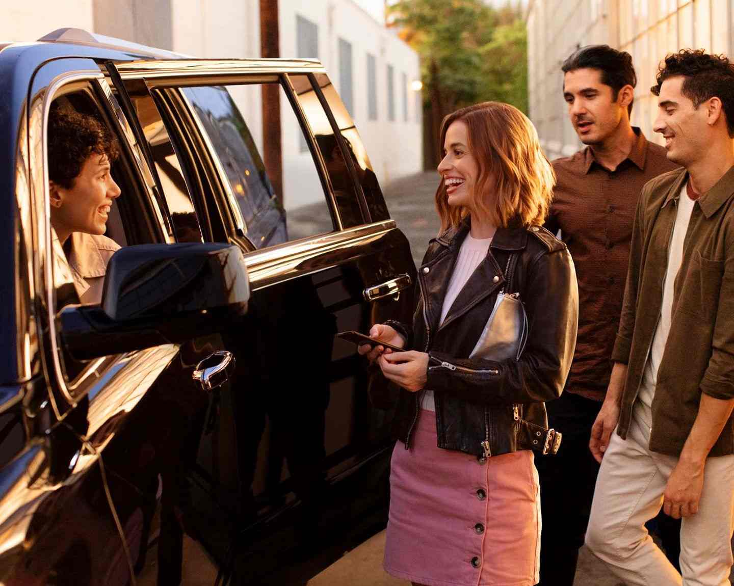 Riders speaking with Uber driver