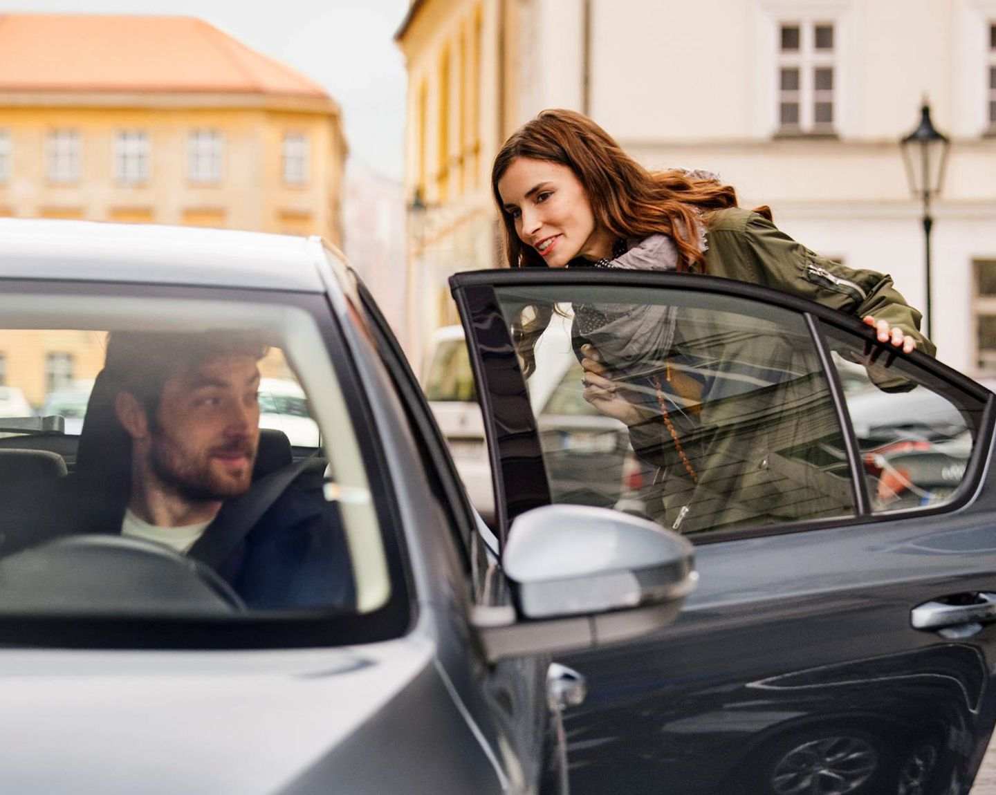 Rider getting into an Uber ride