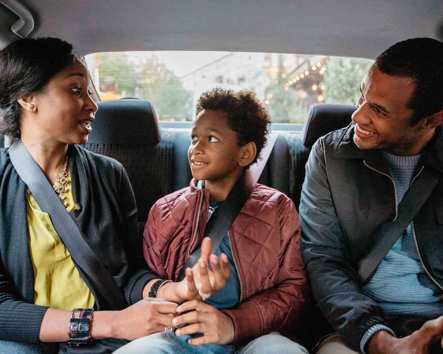 family belted up in their ride