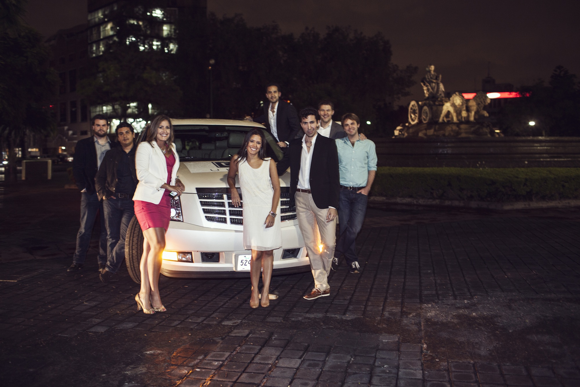 Uber Team w_ Escalade and Fountain